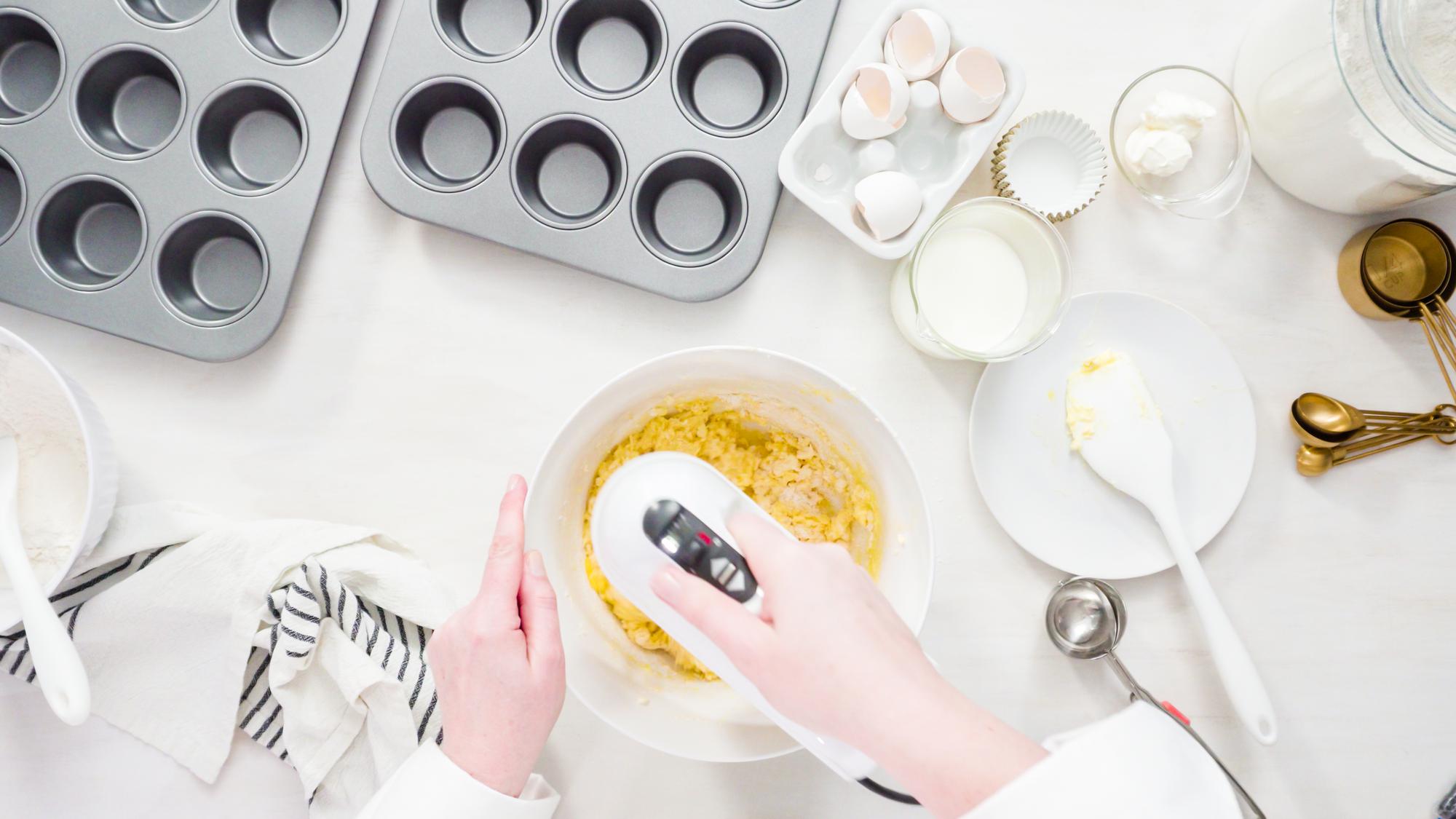 Hands preparing a dessert